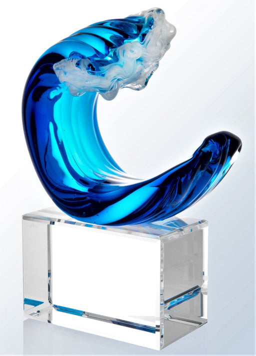 Wave art glass award with dark blue body and pearl white caps